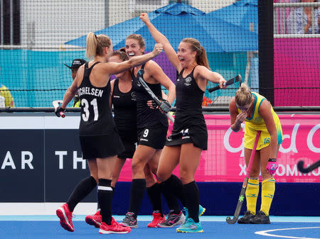 Hockey - Gold Coast 2018 Commonwealth Games - Women's Gold Medal Match - New Zealand v Australia - Gold Coast Hockey Centre - Gold Coast, Australia - April 14, 2018. New Zealand players celebrate winning the gold medal. REUTERS/David Gray