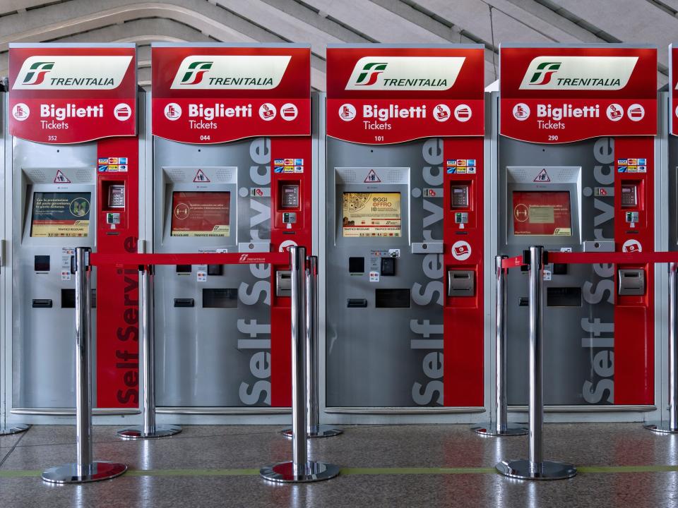 Trenitalia self service train ticket machines at the empty Roma Termini central railway station.