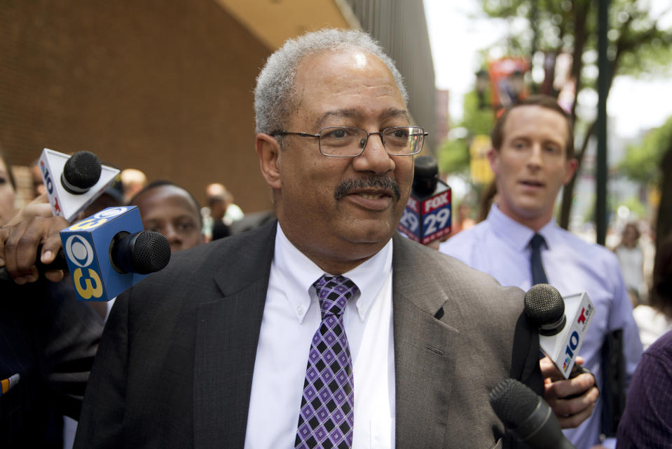 FILE - In this Tuesday, June 21, 2016, file photo, Rep. Chaka Fattah, D-Pa., walks after leaving the federal courthouse in Philadelphia. Fattah, a longtime Pennsylvania congressman serving a 10-year prison term, will ask a judge Friday, July 12, 2019, to reduce his sentence after four bribery and money laundering counts were thrown out on appeal. (AP Photo/Matt Rourke, File)