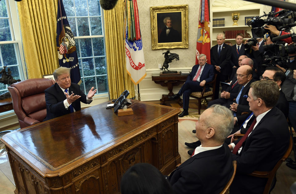President Donald Trump meets with Chinese Vice Premier Liu He, center left, as U.S. Trade Representative Robert Lighthizer, front right, listen in the Oval Office of the White House in Washington, Friday, Feb. 22, 2019. (AP Photo/Susan Walsh)