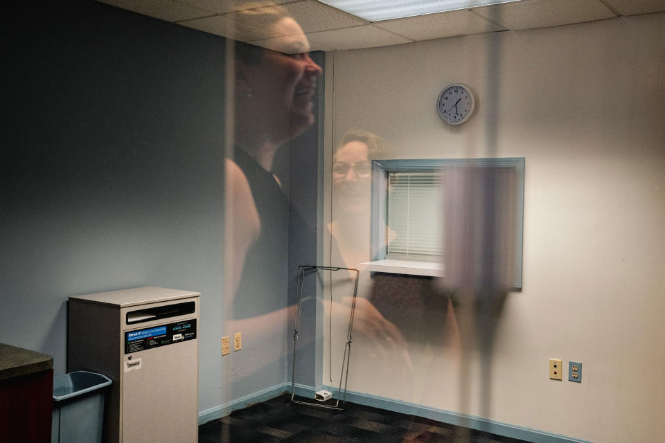 A reflection of Horvath and Nuzzo seen in an empty space where they plan to start their abortion clinic in College Park, MD.<span class="copyright">Shuran Huang for TIME</span>