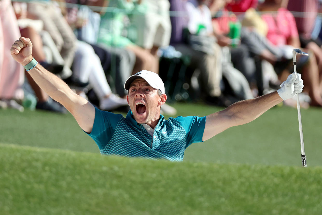 AUGUSTA, GEORGIA - APRIL 10: Rory McIlroy of Northern Ireland reacts after chipping in for birdie from the bunker on the 18th green during the final round of the Masters at Augusta National Golf Club on April 10, 2022 in Augusta, Georgia. (Photo by Gregory Shamus/Getty Images)