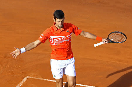 Tennis - ATP 1000 - Italian Open - Foro Italico, Rome, Italy - May 19, 2019 Serbia's Novak Djokovic celebrates during the final against Spain's Rafael Nadal REUTERS/Matteo Ciambelli