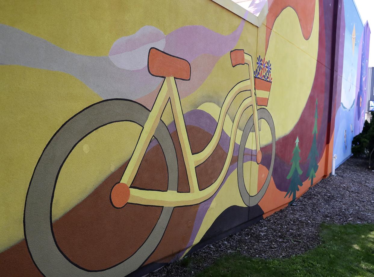 "Happy Bicycle Day" is painted outside Fond du Lac Cyclery, 209 S. Main St.