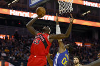 Toronto Raptors forward Pascal Siakam (43) shoots against Golden State Warriors forward Jonathan Kuminga (00) during the first half of an NBA basketball game in San Francisco, Friday, Jan. 27, 2023. (AP Photo/Jed Jacobsohn)