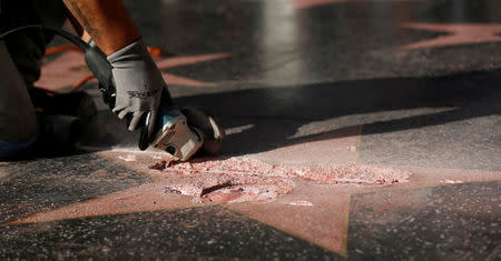 Donald Trump's star on the Hollywood Walk of Fame is fixed. The former host of the NBC show "The Apprentice," Trump received his Walk of Fame star in 2007. A spokeswoman for Trump could not be reached immediately for comment. REUTERS/Mario Anzuoni