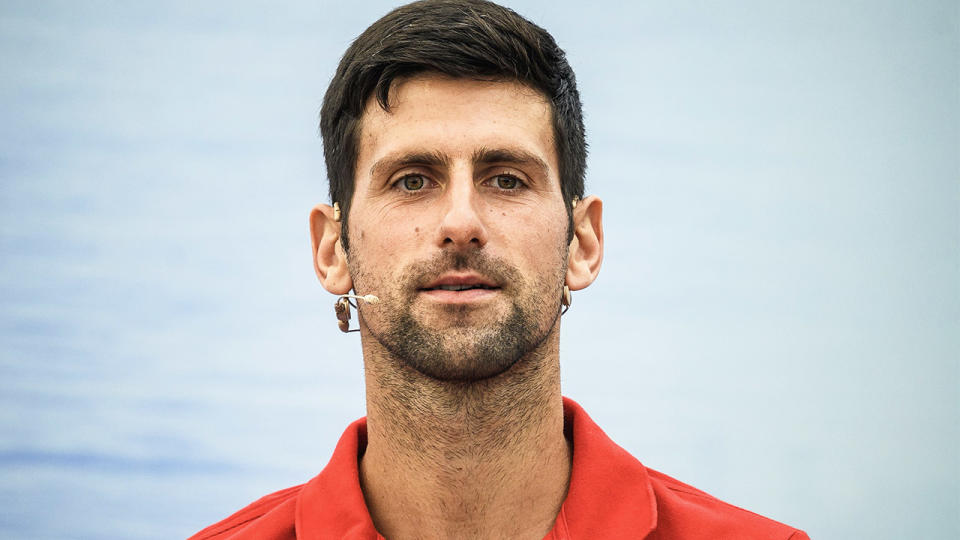 Novak Djokovic (pictured) answering questions on stage.