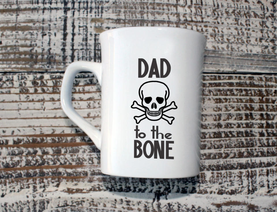 Get the <a href="https://www.etsy.com/listing/234025188/personalized-coffee-mug-custom-coffee">"Dad to the Bone" mug</a>.