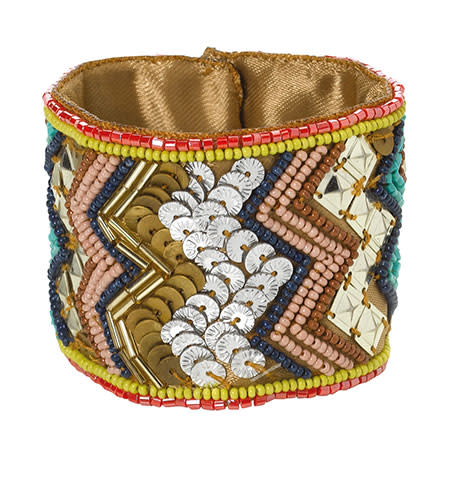 For a statement arm candy piece, try this colourful sequin and beaded Arizona cuff from Accessorize that caught our eye. <br><br> £12 <a href="http://uk.accessorize.com/view/product/uk_catalog/acc_2,acc_2.2/1841339900" rel="nofollow noopener" target="_blank" data-ylk="slk:Acessorize;elm:context_link;itc:0;sec:content-canvas" class="link ">Acessorize</a>