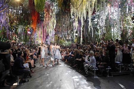 Models present creations by Belgian designer Raf Simons as part of his Spring/Summer 2014 women's ready-to-wear fashion show for French fashion house Christian Dior during Paris fashion week September 27, 2013. REUTERS/Benoit Tessier