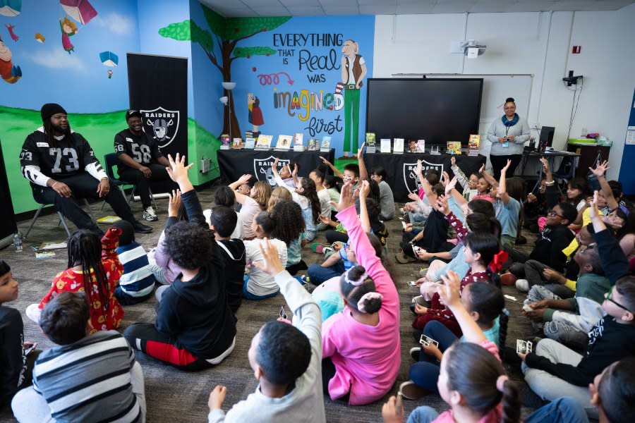 The Las Vegas Raiders visit students for Nevada Reading Week in effort to spread the love of reading at Addeliar D. Guy III Elementary School, Thursday, March 7, 2024, in Las Vegas, Nev. (Credit: Raiders)