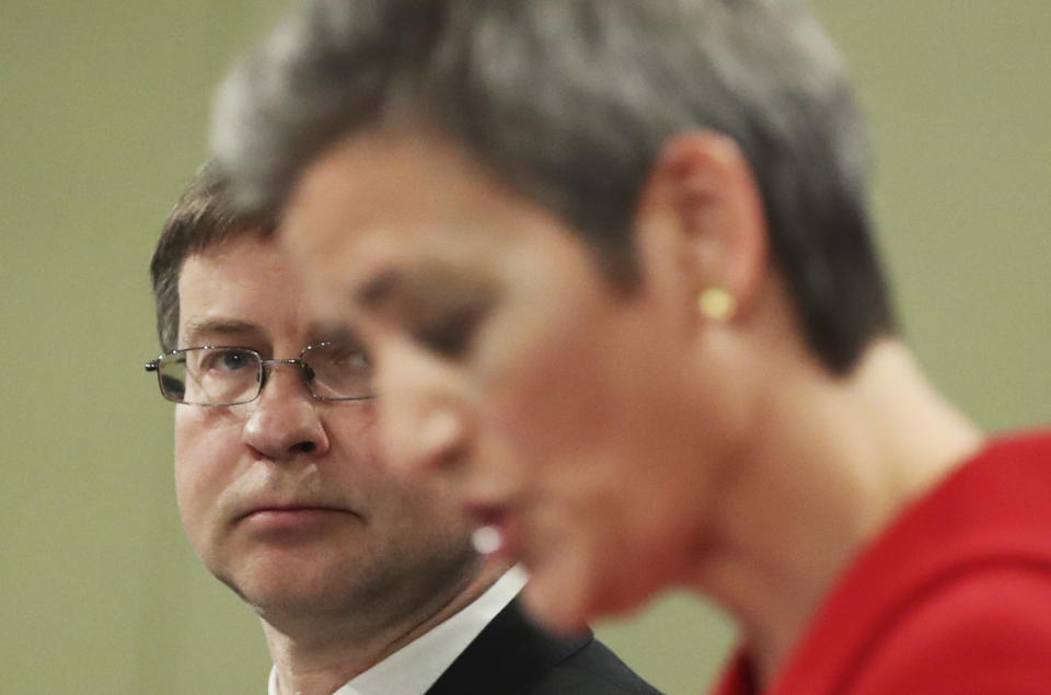 European Commission Vice Presidents Margrethe Vestager, right, and Valdis Dombrovskis participate in a media conference on the proposal for a Regulation to address distortions caused by foreign subsidies in the Single Market and on the European Industrial Strategy Update at EU headquarters in Brussels, Wednesday, May 5, 2021. (Yves Herman, Pool via AP)