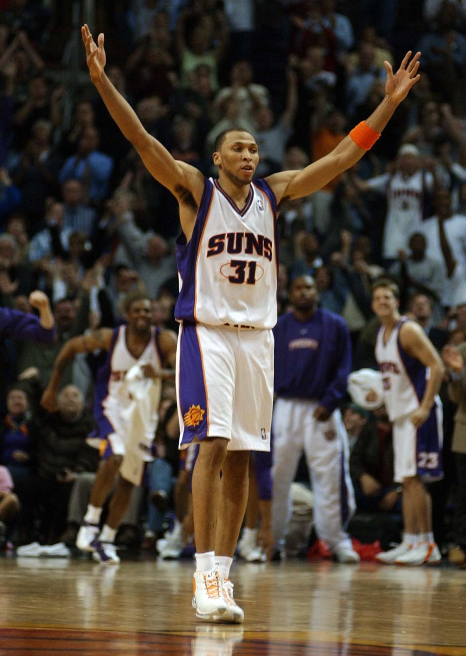 Shawn Marion of the Suns celebrates after hitting a three-pointer to help force overtime in the Suns' 115-111 victory against the Chicago Bulls, Monday, Feb. 3, 2003, at America West Arena in Phoenix.