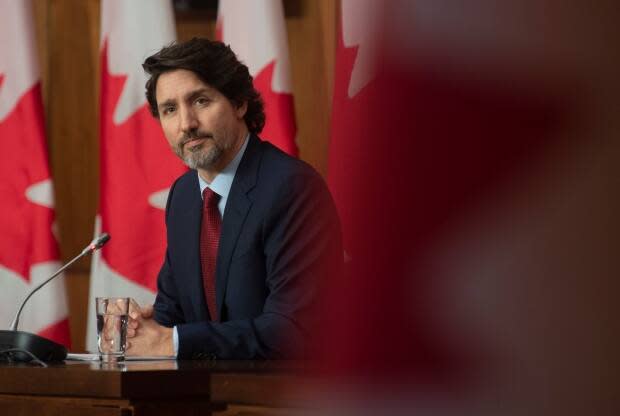 Prime Minister Justin Trudeau listens to a question during  a news conference in Ottawa, Friday, Feb. 19, 2021. (Adrian Wyld / Canadian Press - image credit)