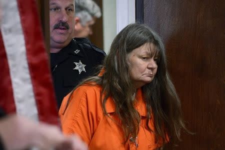 Deborah Leonard enters the court room to stand in front of Honorable Judge Bill M. Virkler for a manslaughter charge against her in the death of her 19-year-old son Lucas Leonard, in New Hartford, New York October 16, 2015. REUTERS/Tina Russell/Observer-Dispatch/Pool