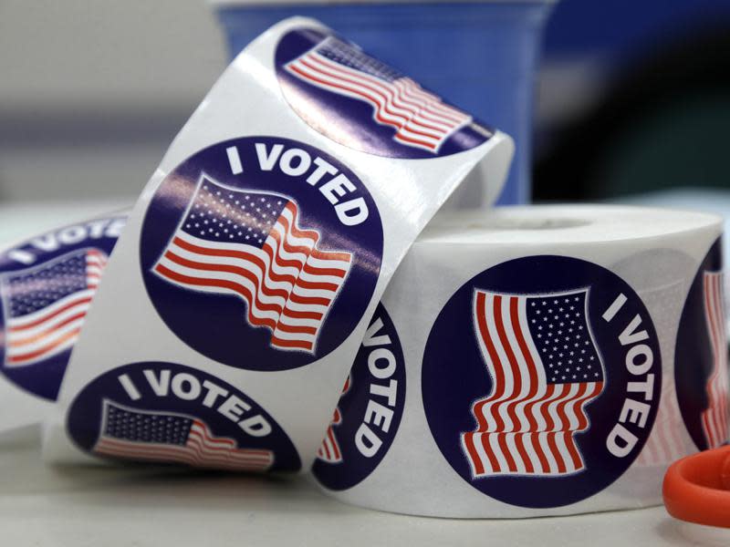 Stickers await voters after they cast their votes on Election Day at Glenwood Center in Greensboro, N.C., Tuesday, Nov. 4, 2014.