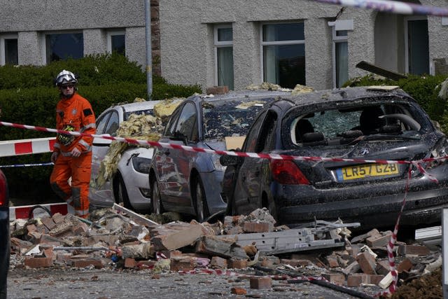 Cars in the street were also damaged