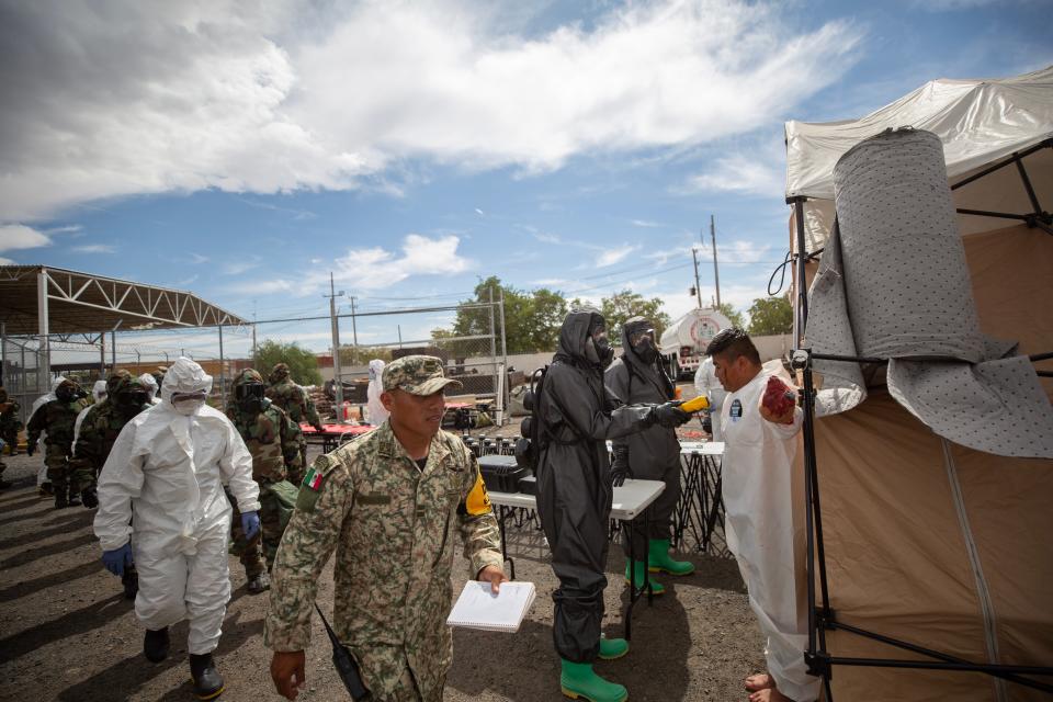 US Army troops and Mexican soldiers participate in a joint military exercise at Ciudad Juárez train depot in a simulation of a train derailment with chemicals on June 27, 2024.