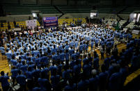 <p>Residents involved with illegal drugs take a pledge that they will not use or sell “Shabu” (Meth) again after surrendering to the police and government officials in Makati, metro Manila, Philippines on Aug. 18, 2016. (REUTERS/Erik De Castro) </p>