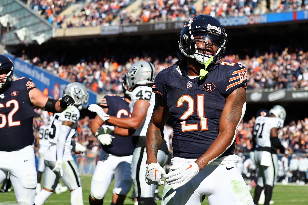 Chicago Bears running back D'Onta Foreman reacts after scoring a touchdown against the Las Vegas Raiders in the second half at Soldier Field.