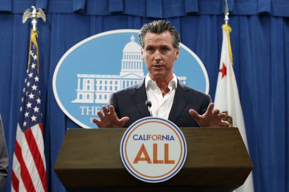 Gov. Gavin Newsom announces that California will spend $20 million on a public awareness campaign about the dangers of vaping nicotine and cannabis products amid a rise in vaping-related illnesses, during a news conference in Sacramento, Calif., Monday, Sept. 16, 2019. (AP Photo/Rich Pedroncelli)