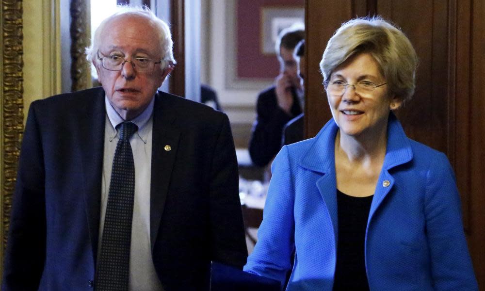 U.S. Senator Sanders and Warren walk to the Senate floor after the weekly Democratic caucus policy luncheon at the U.S. Capitol in WashingtonU.S. Senators Bernie Sanders (I-VT) (L) and Elizabeth Warren (D-MA) walk to the Senate floor after the weekly Democratic caucus policy luncheon at the U.S. Capitol in Washington May 12, 2015. REUTERS/Jonathan Ernst - RTX1CNZA