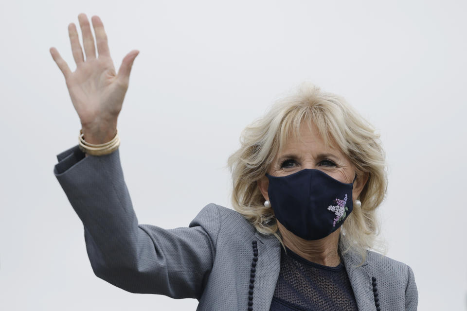 First lady Jill Biden arrives to board an aircraft as she departs Washington on travel to Salt Lake City, Utah, Wednesday, May 5, 2021, at Andrews Air Force Base, Md. (Carlos Barria/Pool via AP)