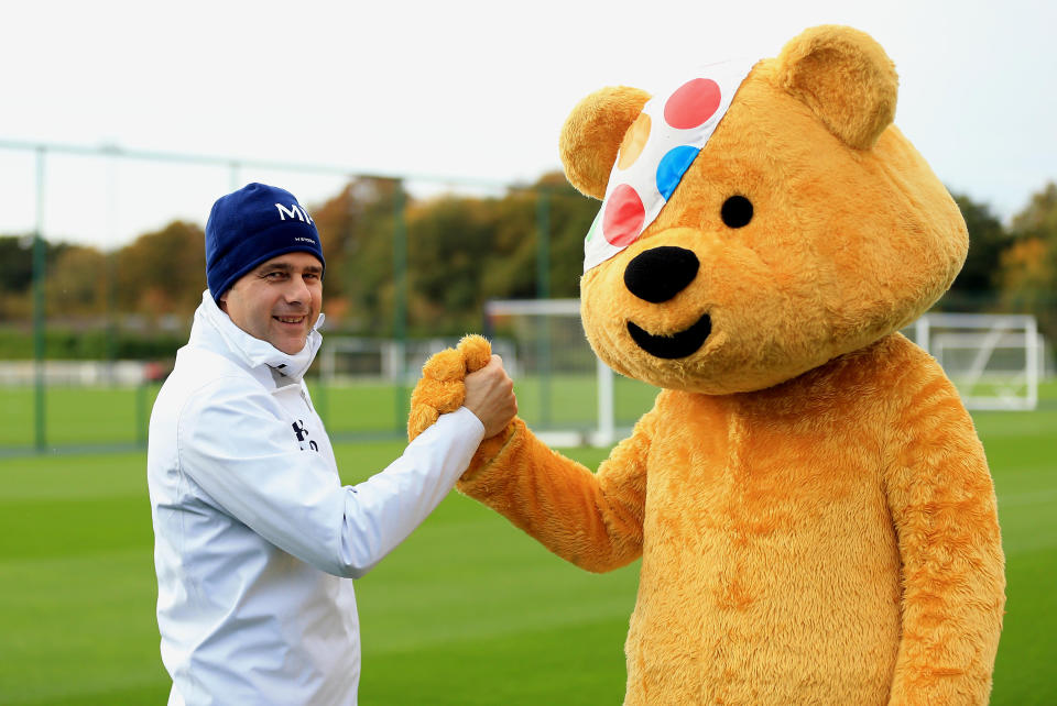 ENFIELD, ENGLAND - OCTOBER 28:  Children In Need's Pudsey Bear meets Tottenham Manager Mauricio Pochettino at the club's training ground on October 28, 2015 in Enfield, England. (Photo by Tottenham Hotspur FC via Getty Images)