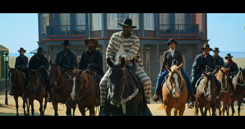 THE HARDER THEY FALL (L to R) (4th from Left): DELROY LINDO as BASS REEVES, IDRIS ELBA as RUFUS BUCK, and REGINA KING as TRUDY SMITH in THE HARDER THEY FALL Cr. COURTESY OF NETFLIX Â© 2021