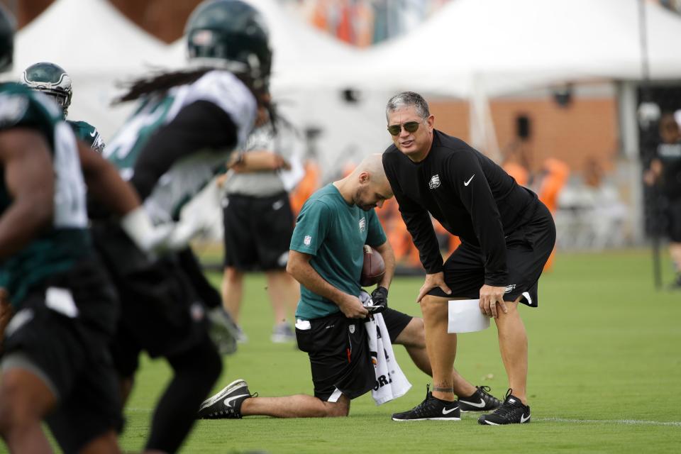 Eagles defensive coordinator Jim Schwartz coaches during training camp in Philadelphia, Monday, July 24, 2017.