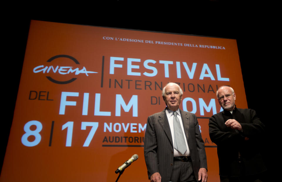 Paolo Ferrari, President of "Fondazione Cinema per Roma", left, and Rome Film Festival artistic director Marco Muller pose for photographers before they present the 8th edition of the Rome Film Festival at Rome's auditorium, Monday, Oct. 14, 2013. The Festival opens on Nov. 8 and will go on until Nov. 17. (AP Photo/Alessandra Tarantino)