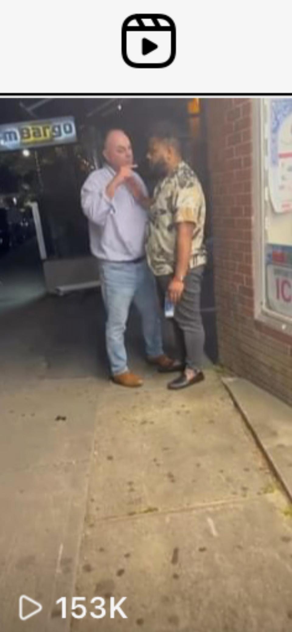 A screenshot from an Instagram video shows John Shea, a businessman associated with Trader Ed's in Hyannis, and Millyan Phillips of Medford on Thursday on Main Street in Hyannis. An altercation between Shea and Phillips is under investigation by a Barnstable Police Department civil rights officer.