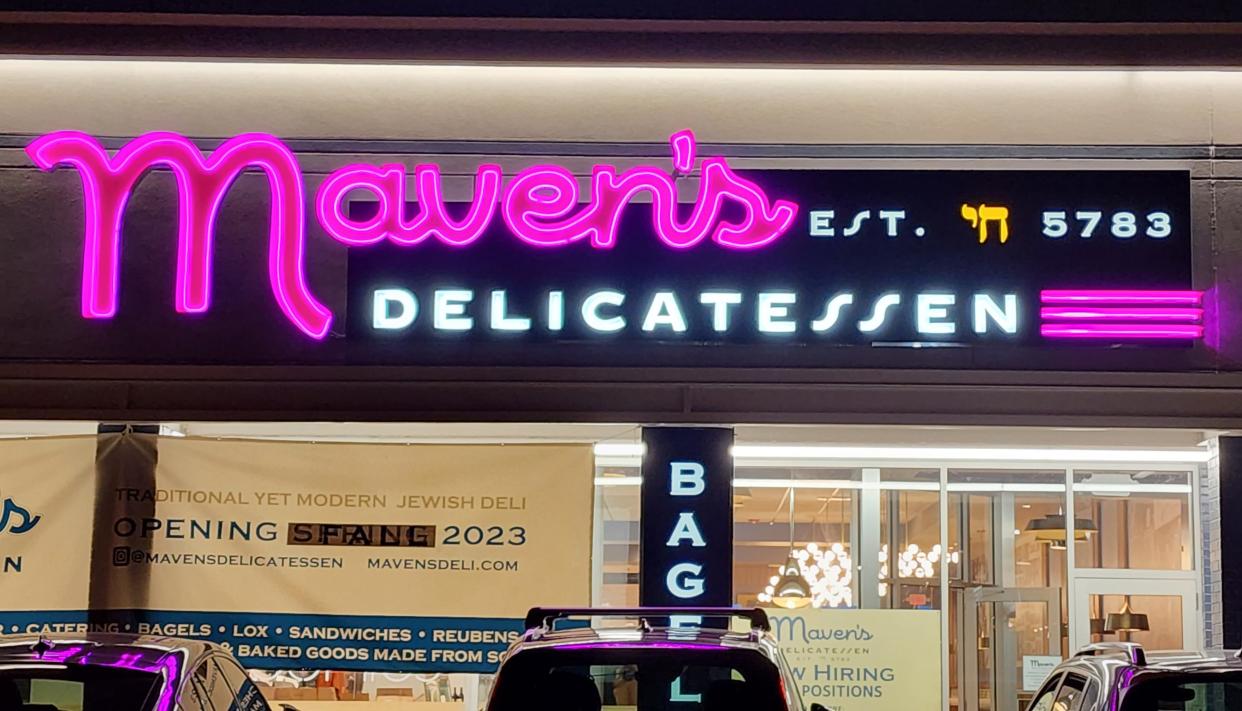 The neon sign for Maven's couldn't be more perfect.