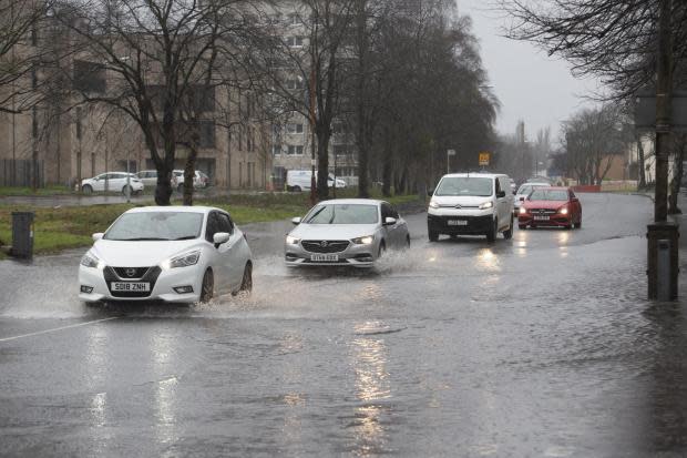 Generic image of cars in the rain