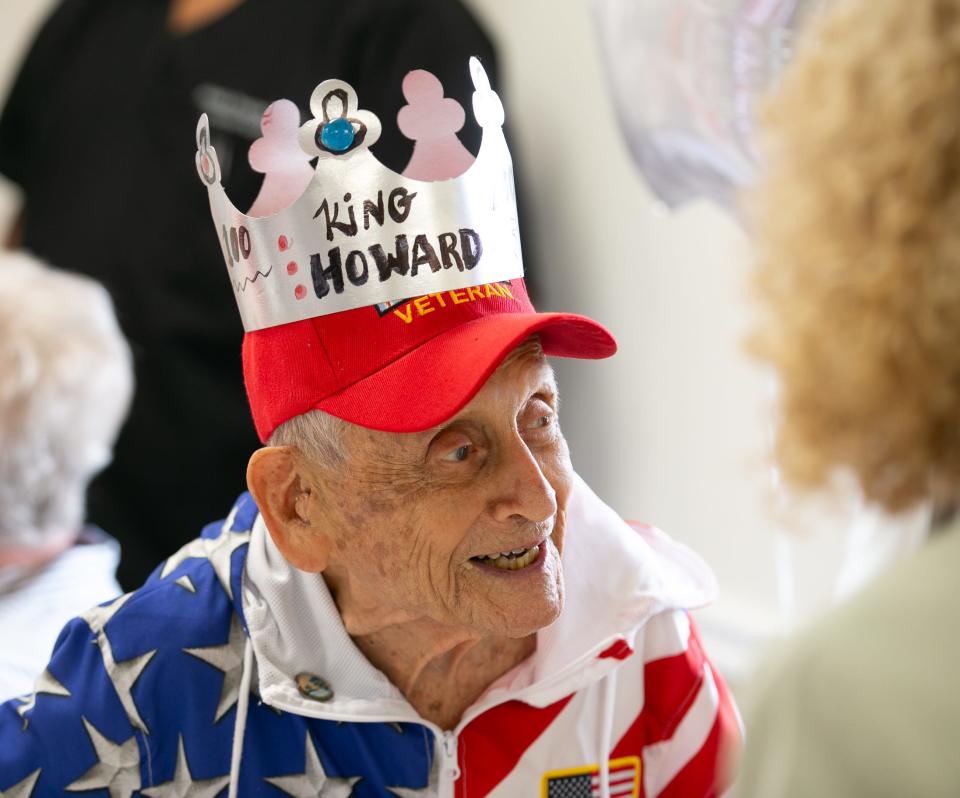 Howard Mautner celebrates his 100th birthday with friends and dignitaries at Spanish Oaks Community Center in Ocala on April 27.