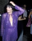 <p>Liza Minnelli looks impeccable in a purple sequined jumpsuit with a matching sheer jacket as she leaves a night of fun at Studio 54. </p>