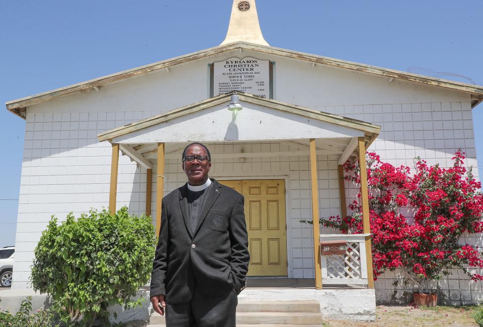 Parstor Carl McPeters stands in front of the Kyriakos Christian Center. The church is one of the few remaining buildings that was not razed in the John Nobles neighborhood of Indio, Calif., April 28, 2022.