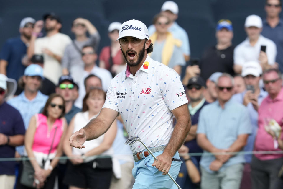 Max Homa reacts as he misses a birdie-attempt on the 18th green during the second round of the BMW Championship golf tournament, Friday, Aug. 18, 2023, in Olympia Fields, Ill. (AP Photo/Charles Rex Arbogast)