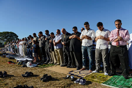 FILE PHOTO - People participate in a group prayer session for the Muslim holiday Eid al-Adha in the Brooklyn borough of New York City, U.S. on August 12, 2016. REUTERS/Stephanie Keith/File Photo