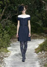 <b>Chanel SS13:</b> Tailored, waist-highlighting creations embodied trademark Chanel.<br><br>© Reuters