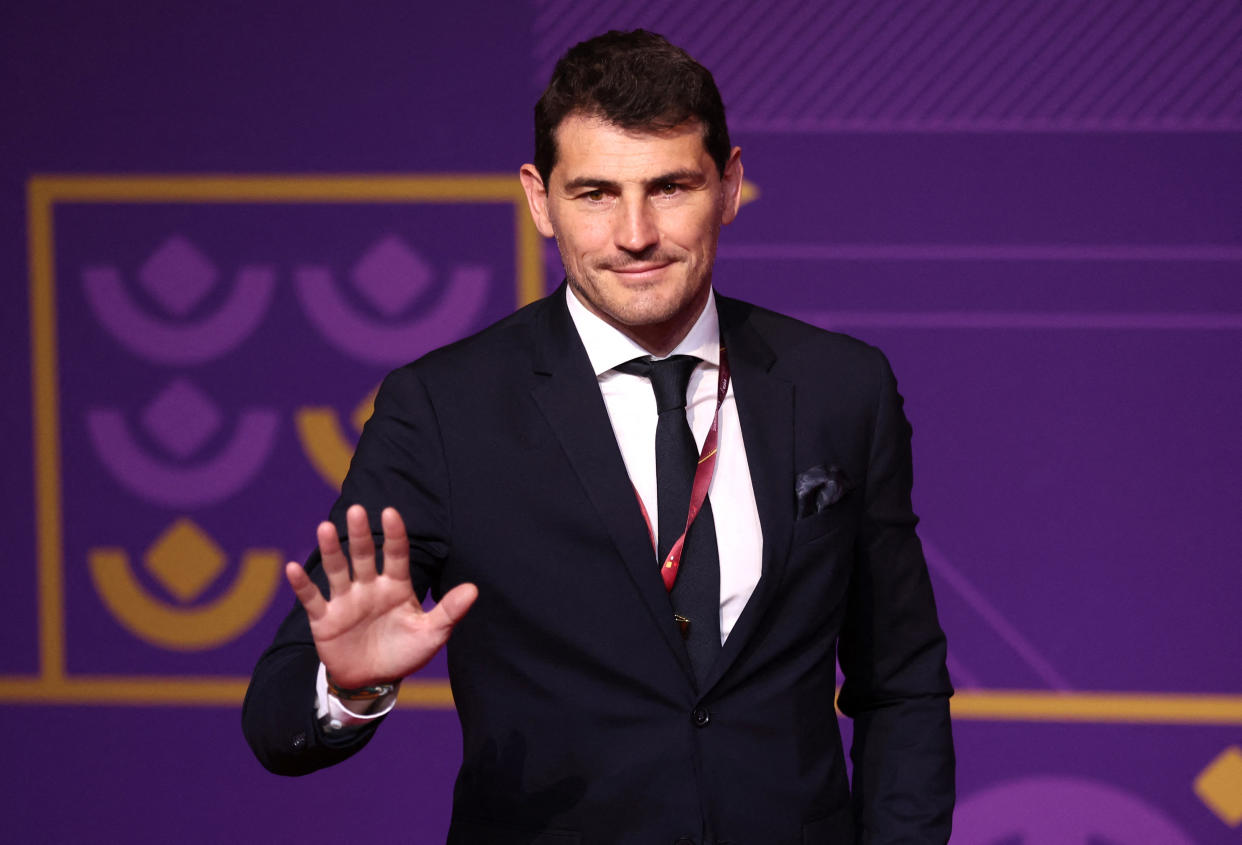 Former Spanish national goalkeeper Iker Casillas waves to the audience at the 2022 Qatar World Cup draw. 