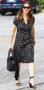 <p>Garner stepped out on Sunday in a modest black dress with a beige jungle cat and leaf print, which she paired with a matching tote and a set of ankle strap block heel sandals (shop a similar pair <a rel="nofollow noopener" href="https://click.linksynergy.com/fs-bin/click?id=93xLBvPhAeE&subid=0&offerid=293189.1&type=10&tmpid=12371&RD_PARM1=http%3A%2F%2Fwww.barneys.com%2Fproduct%2Fgianvito-rossi-versilia-ankle-strap-sandals-504503151.html%3F&u1=ISJenniferGarnerSSIJApril" target="_blank" data-ylk="slk:here;elm:context_link;itc:0;sec:content-canvas" class="link ">here</a>).</p>