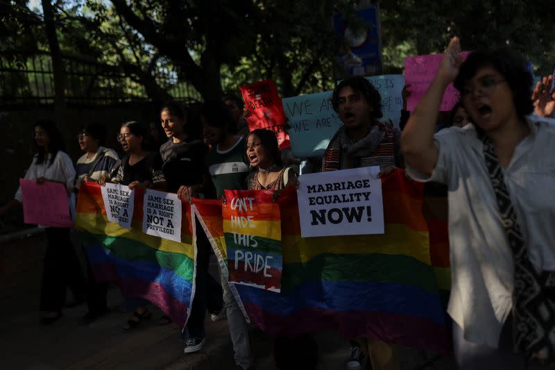 Students and supporters of Students' Federation of India (SFI) take part in an LGBT+ Pride vigil at North Campus in New Delhi