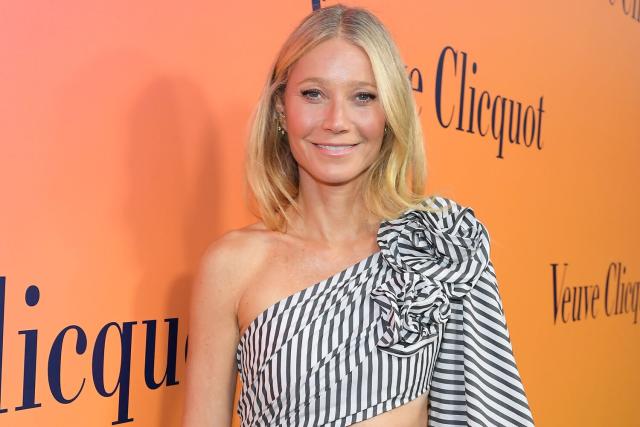 Gwyneth Paltrow Brings Her Famous Abs to the Red Carpet in Cutout Carolina  Herrera Gown
