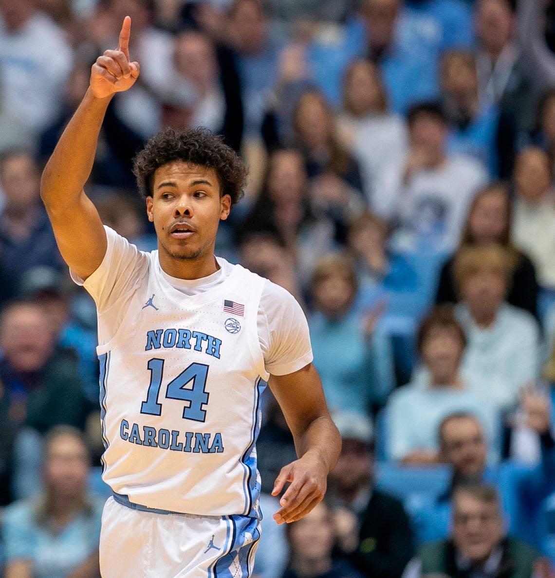 North Carolina’s Puff Johnson (14) reacts after a basket in the second half against Clemson on Saturday, February 11, 2023 at the Smith Center in Chapel Hill, N.C. Johnson scored eight points.
