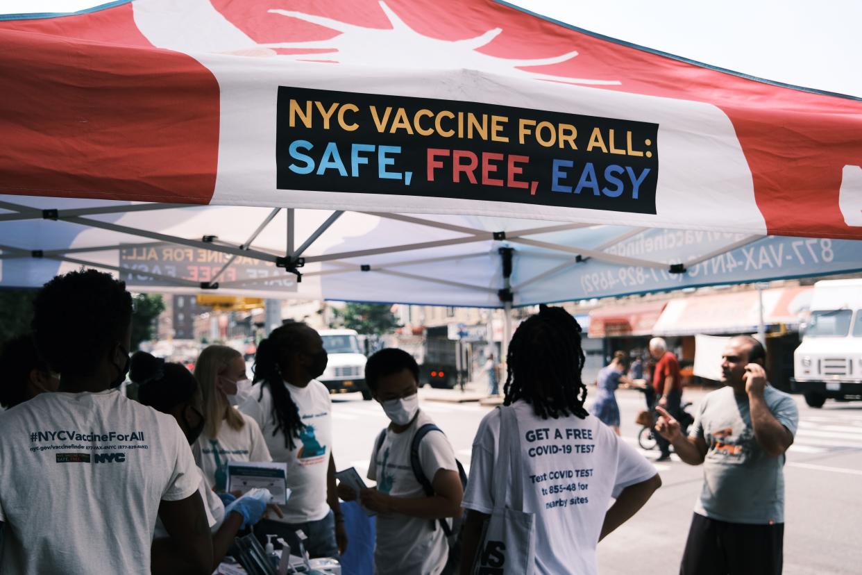 A city-operated mobile pharmacy advertises the COVID-19 vaccine in a neighborhood near Brighton Beach in Brooklyn, New York.