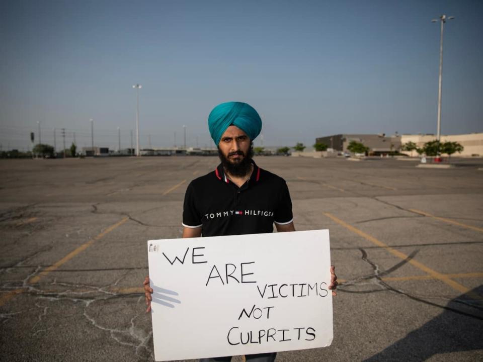 Lovepreet Singh has been camped outside a Canadian Border Services Agency office outside Toronto for 12 days. (Nav Rahi/CBC - image credit)