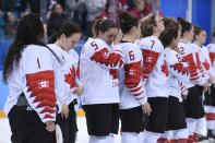 <p>The Canada team reacts on the podium during the medal ceremony after getting the silver medal in the women’s ice hockey event during the Pyeongchang 2018 Winter Olympic Games at the Gangneung Hockey Centre in Gangneung on February 22, 2018. / AFP PHOTO / JUNG Yeon-Je (Photo credit should read JUNG YEON-JE/AFP/Getty Images) </p>