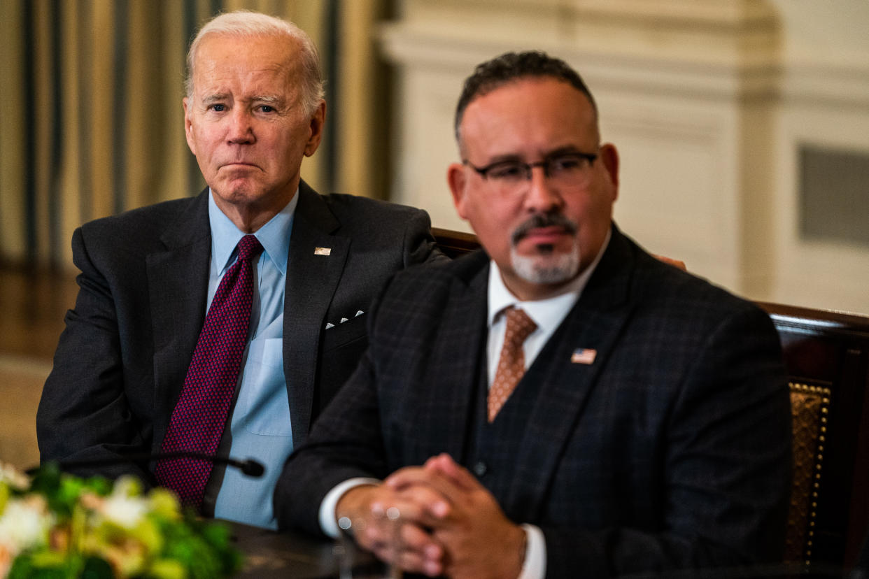 WASHINGTON, DC  October 4, 2022:

US President Joe Biden and Department of Education Secretary Miguel Cardona during the second meeting of the Task Force on Reproductive Healthcare Access in the State Dining Room on Tuesday, October 4, 2022.
(Photo by Demetrius Freeman/The Washington Post via Getty Images)