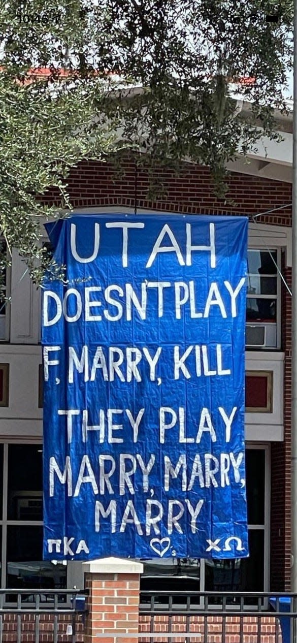A sign displayed outside a University of Florida fraternity house before the UF football game against the University of Utah.